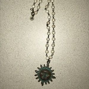 raw & rebellious sun pendant